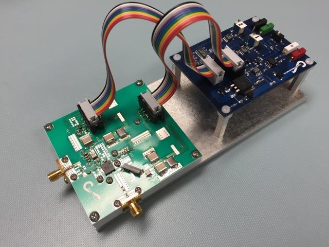 P a g e 3 mounted on a milled aluminum block that acts as a heat sink as well as provides mechanical support for the SMA and ribbon cables attached to the RF board.