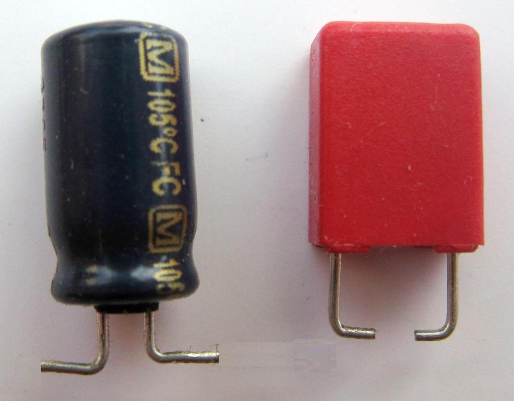 My favorite method is to grip the capacitor from above with a pair of pliers, push DOWN, and simultaneously firmly twist the capacitor in the horizontal plane, about 120-180.