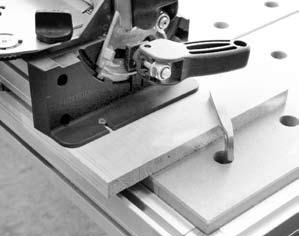 Preparation of router Mounting of copying ring (centring!). Mounting of intended cutter.