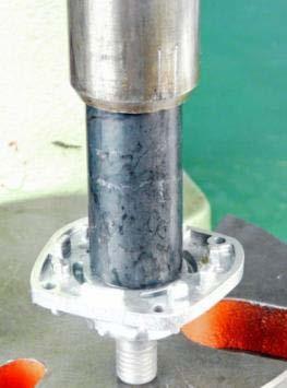 Press grooved ball bearing () into