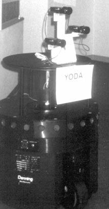 Figure 1. YODA Wandering the Halls of the Information Sciences Institute. computer is accomplished through an RS232 serial port using a remote programming interface (Denning 1989).