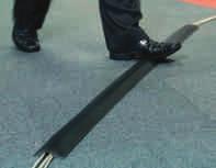 They secure loose leads and cables in any environment. Prevents accidents caused by loose, trailing cables. Simply open the slitted base, push in the cables and lay the protector on the floor.