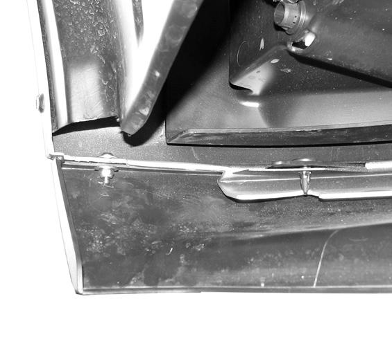 Driver Side Installation Pictured Hold the splash guard up to the brackets and