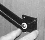 Slide Lock Bar up when lowering to prevent damage). I. Thread the Center Screw holding the Side Arm to the cover as seen in the right illustration above and tighten.