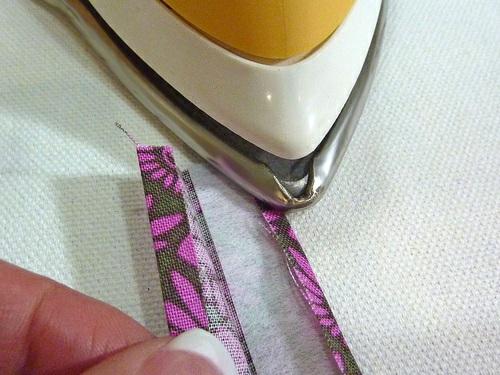 Fold back and press the outer edge ¼ along the interfacing.