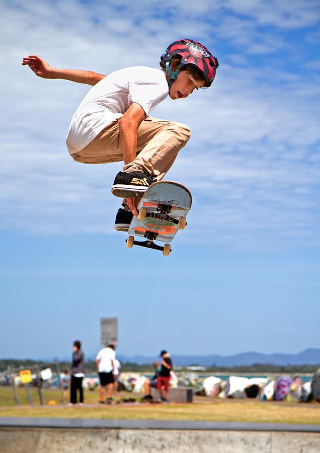 In this image a fast shutter speed (1/1250 th sec) froze the skateboarder in mid air, with little motion