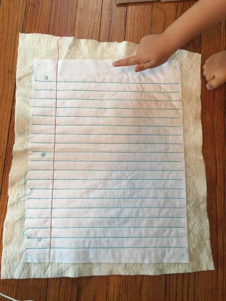 Next comes the fun part! Once your lines are sewn use your fabric pen to write your inspiration message to your kiddo.