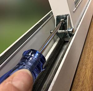 STEP 30: Screw the Vacation Lock to your sliding glass door Fasten the Vacation Lock to your sliding glass
