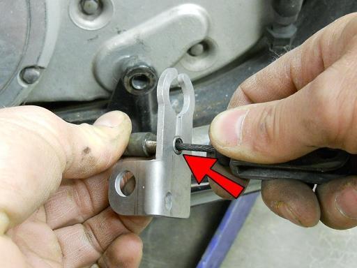 Insert the wire part of the brake cable into the top slot of the