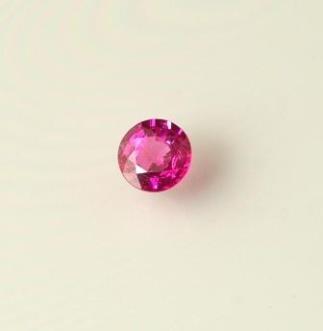 Sapphire Hot Pink or Ruby? New GIA guidelines say this may be called a ruby because it is very difficult to define where an exact color begins. We choose to call this a Hot Pink!