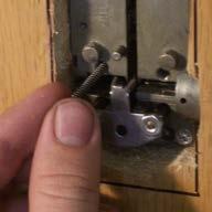 Step 4: Installing Lock Body In Door Continued Insert reset button springs (1 on each side of lock) into threaded screw holes.