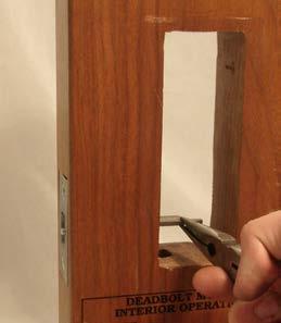 In the Event of a Lockout Scenario A lockout scenario can occur when the bolt control rod of the latch is allowed to enter the opening in the door stop strike plate.