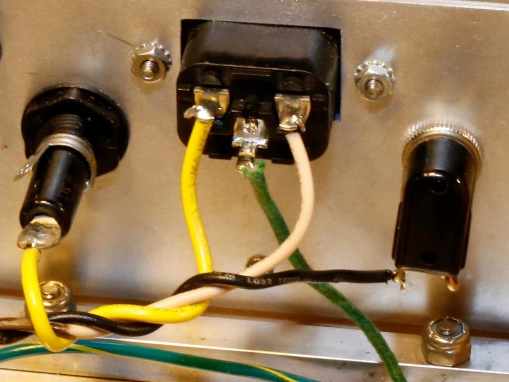 102. Use yellow wire from the leftover transformer trimmings, solder it to the center lug of the fuse holder.