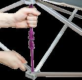 TO COLLAPSE To collapse unit, first remove end cap graphics on both sides and fold onto top of frame. 1 Unlock all purple locking arms.
