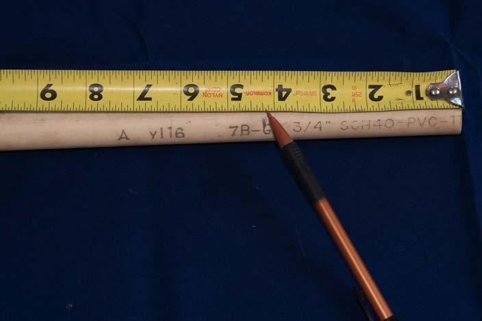 Measure a length of ¾ PVC pipe that corresponds to the depth of your plastic