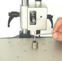 . Step Fix centering pin () on table top with the help of the allan key. 4.