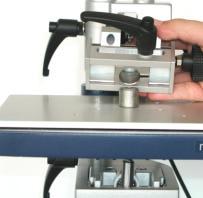 Adjust the clamping device with an angle tool.