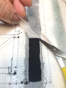 Before moving onto the next step, double- check your tack down line from Step 56 to be sure the fabric is evenly