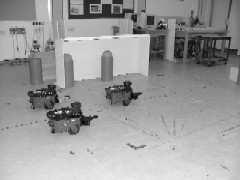 a multiple robot team, with a system in which no intelligence was used to aid the user (other than their own intelligence to control robots low level behaviour).