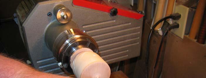 With a sharp spindle gouge carefully trim the waste from the