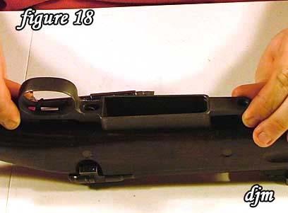 18) If necessary to tap on front and rear of trigger guard to loosen for removal. Remove the trigger guard.