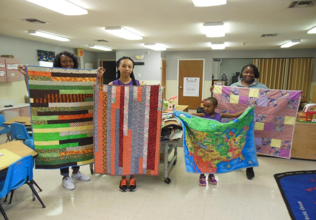 4 Community Quilts Day Meeting Minutes August 16, 2017 Unavailable Delores Fowler displays one of her quilts at Show & Tell. We delivered 40 quilts and 20 bibs to headstart this month.