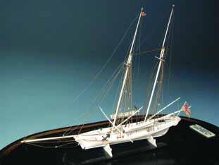 MINIATURE IVORY MODEL OF THE ROYAL YACHT SQUADRON MER- LIN, late 19 th Century, schooner-rigged with
