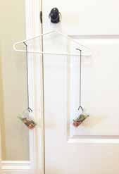 Gather small objects to fill each cup to balance the coat hanger! Show your child what it looks like to be balanced before starting.