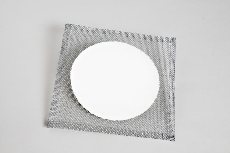 Wire gauze This is attached with a metallic ring and it is used for securing flasks with