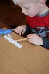 CLICK FOR MORE DETAILS Tape the button icicles onto a longer piece of ribbon and hang across a window. Hot glue can be scary, but with help, kids can use it.