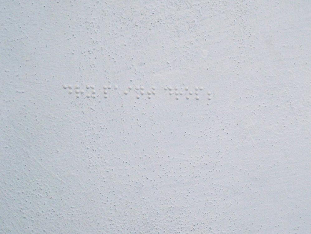Drops of color, 2010, brail alphabet, paint on wall, variable dimensions.