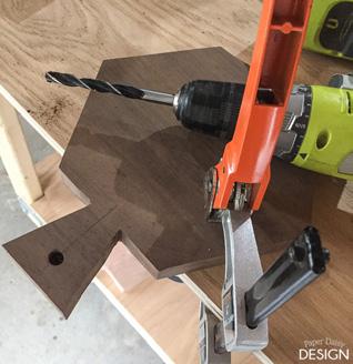 9 A helpful tip: Drill the desired hole only half way through one side and then flip the board over, using the small pilot hole as