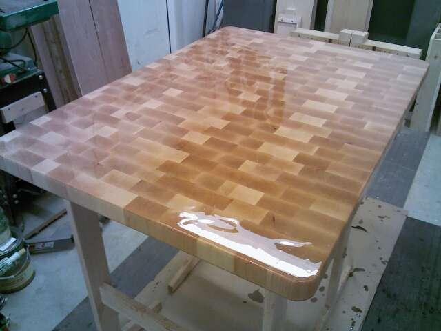 The mineral oil will be absorbed into the end grain within a few hours.
