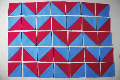 Making one each for the front and back of the bag, lay the half square triangle units out as shown.