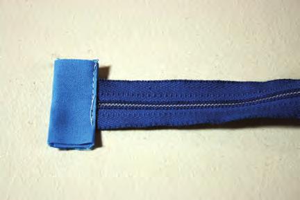 If necessary, trim the zipper to 11 including the zipper tape.