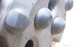 Excess button wear problems: Insufficient impact energy has caused excessive wear in gauge buttons.