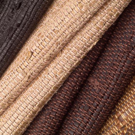 WOVEN GOAT COLLECTION THESE WOVEN GOAT PANELS ARE MADE FROM TANNED GOATSKIN THAT IS CUT INTO STRIPS AND WOVEN TOGETHER.
