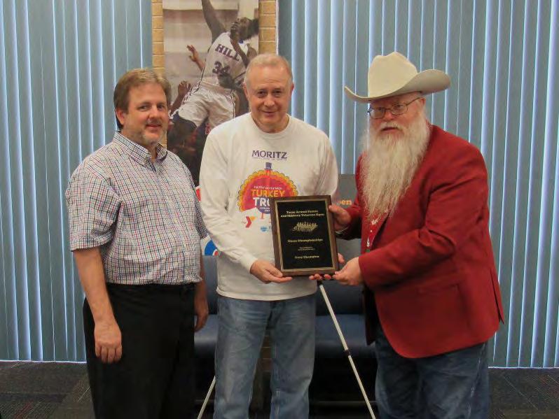 Chief Tournament Director Chris Wood (left) and Chief Organizer Jim Hollingsworth (right) award the title of Texas Armed Forces Navy Champion to Tom Crane (center).