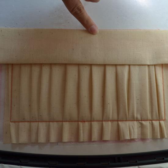 If you haven t ruffled your fabric, press a finger width of the raw edge of Fabric E to the sticky stabilizer and