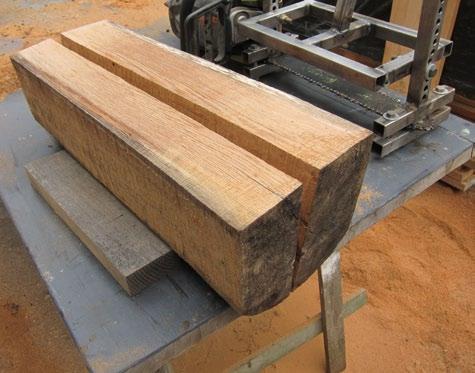 There was no 2 x 8 required for a sliding surface because for the plank cuts the chain saw jig slides along while resting against a