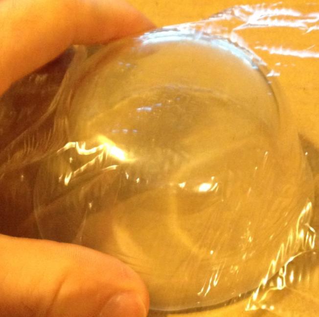 Step 2: With the bowl facing down, apply Saran Wrap around the outside of the bowl