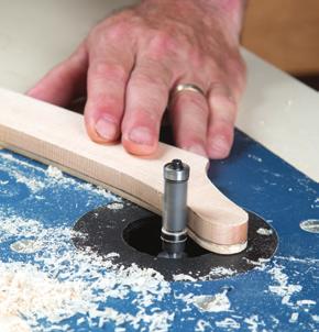 To prevent tearout from routing against the grain, use a combo trim flush-trim bit.