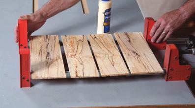 (The extra length allows shifting the pieces for a good match during glue-up.) Face-joint and plane the stock to thickness, joint both edges square, and then resaw as shown.