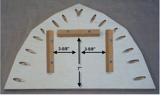 Assembly: Attaching 3/4 x 1/2 molding pieces to the end pieces: 18. Mount one 3/4 x 1/2" x 4 strip centered on the end piece and 7 from the bottom as shown in Figure 19.