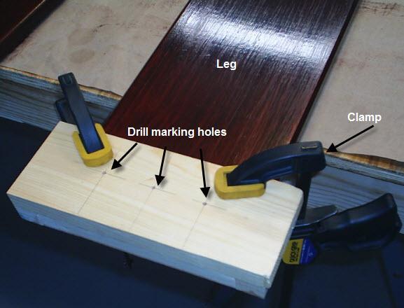 Making screw holes in the legs for attaching the feet: 21. To mark screw holes for the feet, use the jig you made previously in Step17.