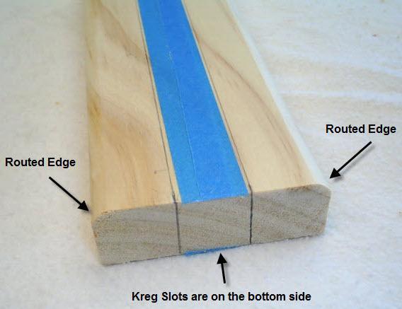 25. Take the two 1 x 3 boards with the Kreg slots you just made and rout the top edges (the side opposite the Kreg slots) as shown in Figure 26.