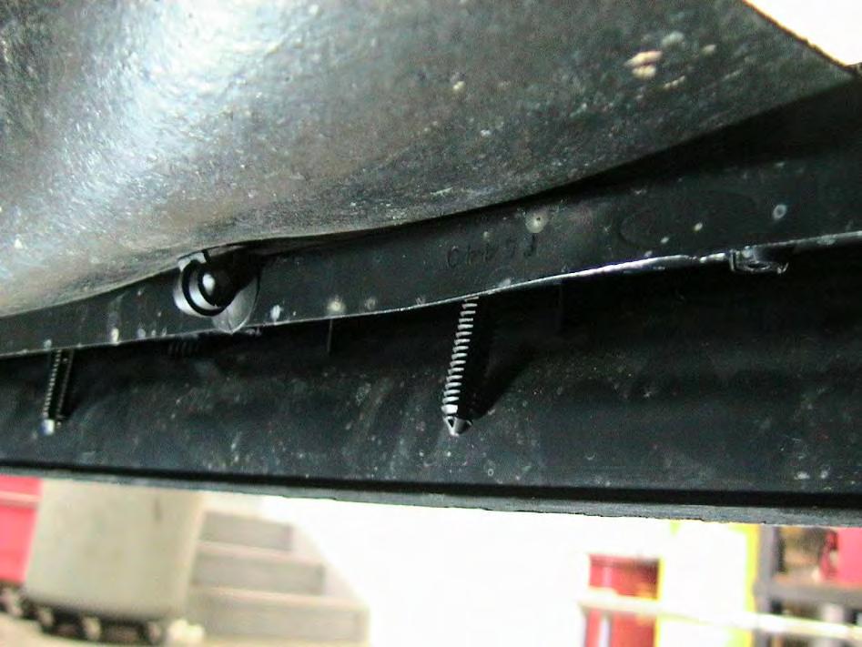 7 N-m) V. VEHICLE PREPARATION 1. Remove the bolt securing the hood latch release lever. Hood latch release lever Figure D 2.