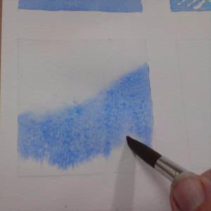 The wax is left on the paper so it means that it will also resist any subsequent washes of colour; in this it is