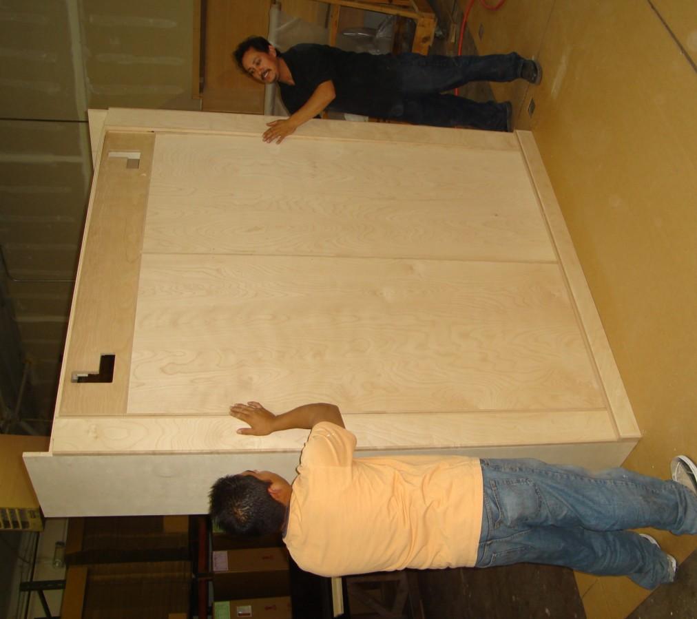 the wallbed using at least two people.