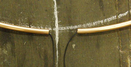 Slide the amplifier in the 22 mm-copper tube.